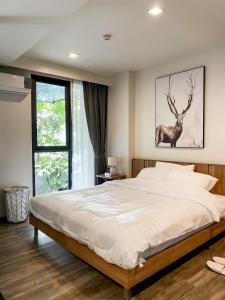 Postel nebo postele na pokoji v ubytování The Deck condominium Patong beach + 12 fotografií