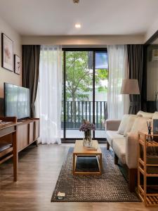 Postel nebo postele na pokoji v ubytování The Deck condominium Patong beach