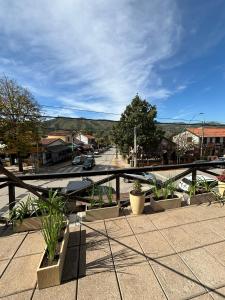 a balcony with a view of a street at The View in Villa General Belgrano