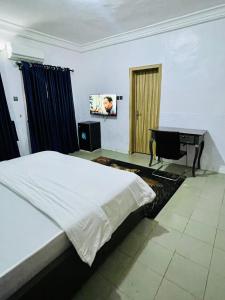 Llit o llits en una habitació de Weena Hotel & Resort