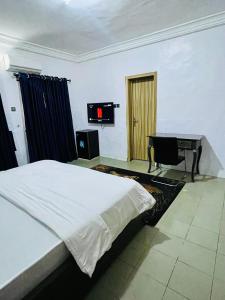 Llit o llits en una habitació de Weena Hotel & Resort