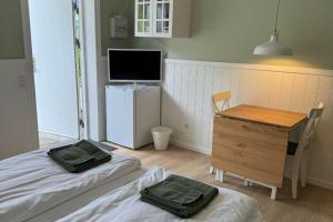 Postel nebo postele na pokoji v ubytování Motel Gavlhuset