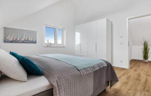 Ein Bett oder Betten in einem Zimmer der Unterkunft Hafenjuwel