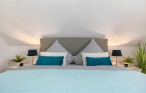 Ein Bett oder Betten in einem Zimmer der Unterkunft Hafenjuwel
