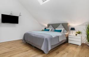 Ein Bett oder Betten in einem Zimmer der Unterkunft Hafenjuwel
