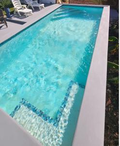 Piscina di Comfi Spaces o nelle vicinanze