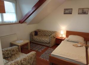 Postel nebo postele na pokoji v ubytování Vila Strážan