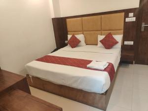 Postel nebo postele na pokoji v ubytování Hotel Tela Suite Near IGI Airport Delhi