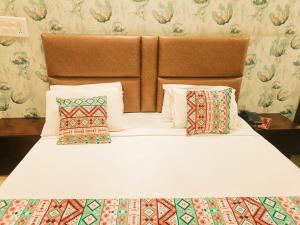 Postel nebo postele na pokoji v ubytování Hotel Tela Suite Near IGI Airport Delhi