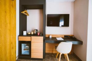 Kuchyň nebo kuchyňský kout v ubytování B1 Downtown Hotel