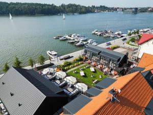 an aerial view of a marina with boats in the water at Kurort Kameralny in Mikołajki