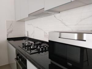 Cucina o angolo cottura di Charming House Tarrafal