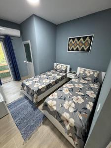 Postel nebo postele na pokoji v ubytování Bujtina e Qilimave + 22 fotografií