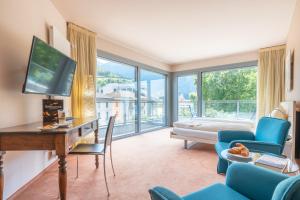 TV a/nebo společenská místnost v ubytování Hotel Unione