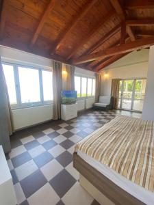 Postel nebo postele na pokoji v ubytování Villa Salyna