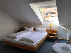 Postel nebo postele na pokoji v ubytování Haus am Meer, Hotel Garni
