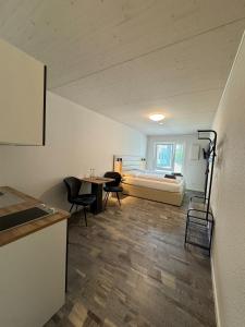 Postelja oz. postelje v sobi nastanitve Hotel Lijo, bei Basel