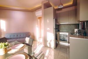 Kuchyň nebo kuchyňský kout v ubytování Ananda Apartments