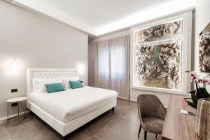 Postel nebo postele na pokoji v ubytování Como Lakeside Suites