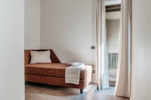 Postel nebo postele na pokoji v ubytování Como Lakeside Suites