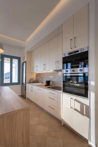 Kuchyň nebo kuchyňský kout v ubytování Apaggio luxury villa