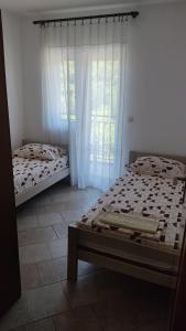 Postel nebo postele na pokoji v ubytování TopHoliday