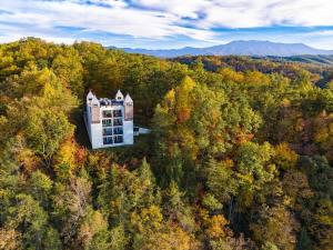 an aerial view of a house in the middle of a forest at Mountain Views at Dolly's Castle Unit 7 in Sevierville