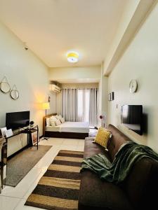 Katil atau katil-katil dalam bilik di Comfy Condo in Malate for 4 - Admiral Baysuites