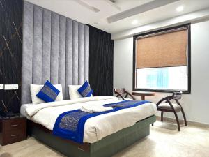 Postel nebo postele na pokoji v ubytování Hotel The Daanish Residency - Karol Bagh