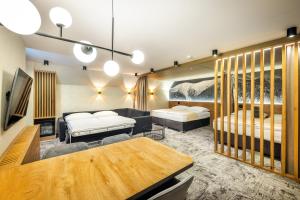 Letto o letti in una camera di Harmony Hotel