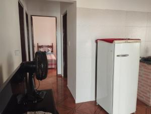 Kuhinja oz. manjša kuhinja v nastanitvi Quarto com cama de casal - Sobrado