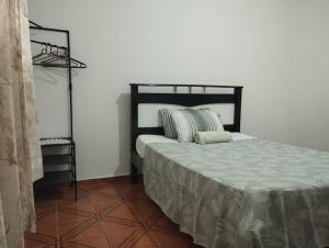 Postelja oz. postelje v sobi nastanitve Quarto com cama de casal - Sobrado