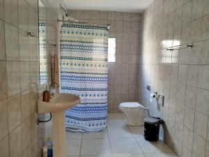 Kopalnica v nastanitvi Quarto com cama de casal - Sobrado