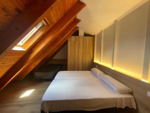 Posteľ alebo postele v izbe v ubytovaní Apartamentos La Solana