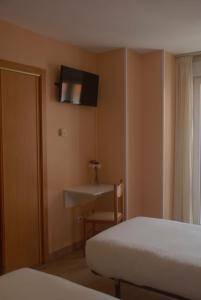 Postel nebo postele na pokoji v ubytování Hotel Flor de Sal