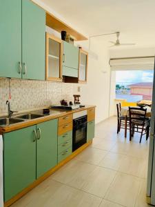 Kuchyň nebo kuchyňský kout v ubytování Casa Mariangela