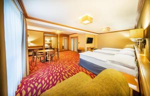 Letto o letti in una camera di Harmony Hotel
