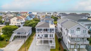an aerial view of a residential neighborhood with houses at Seaside Serenity Beautiful Home on Topsail 7 BR in Surf City