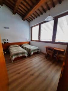 Posteľ alebo postele v izbe v ubytovaní Agriturismo Sartori Terenzio