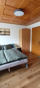 Posteľ alebo postele v izbe v ubytovaní Ferienwohnung Zuppinger