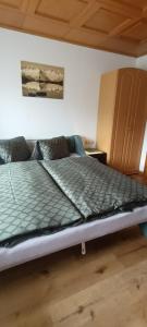 Posteľ alebo postele v izbe v ubytovaní Ferienwohnung Zuppinger
