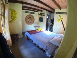 Postel nebo postele na pokoji v ubytování Salkantay Hostel Chaullay