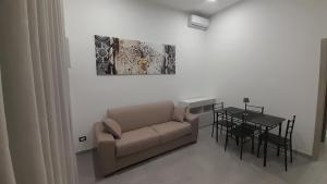 Χώρος καθιστικού στο Caronda House 2