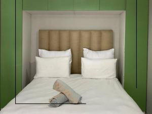 Llit o llits en una habitació de Studio Apartment - SLG Unit 12