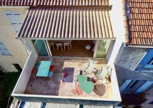 Appartement 7 pers-Terrasse-Vue Parc的阳台或露台