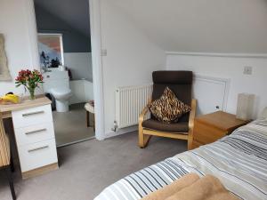 Katil atau katil-katil dalam bilik di Avalon Guest Suite Ewell