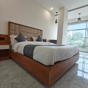 Postel nebo postele na pokoji v ubytování Hotelmaple tree