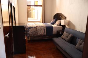 Postel nebo postele na pokoji v ubytování Hotel Senderos de Alux + 38 fotografií