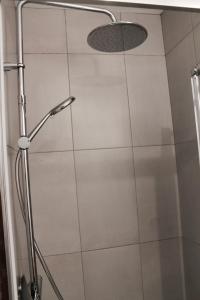 Koupelna v ubytování Duplex accès jacuzzi illimité Z