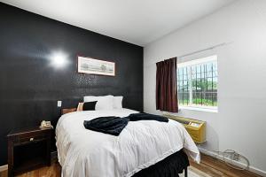 Postel nebo postele na pokoji v ubytování Hotel Dilley Grand